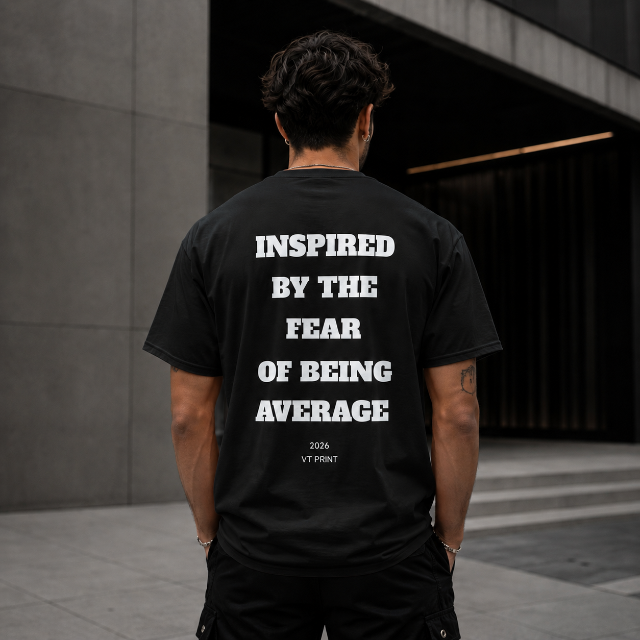 Inspired By The Fear Of Being Average T‑Shirt — Bold Back Text Motivational Tee